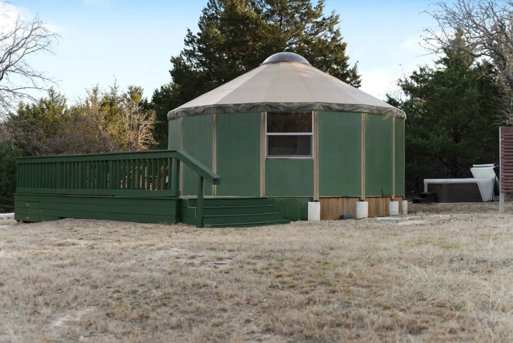 Luxurious outdoor hot tub in a romantic glamping setting